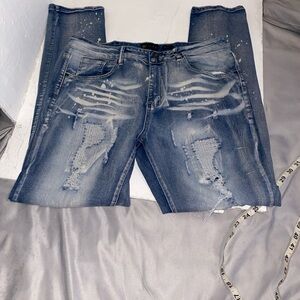 Men's Distressed Blue Jeans by Waima. Size 34